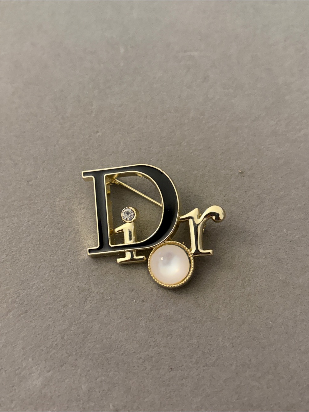 Gold and Black Logo Brooch with Mother-of-Pearl and Crystal Accents